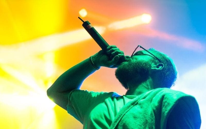 Singer performing holding a microphone