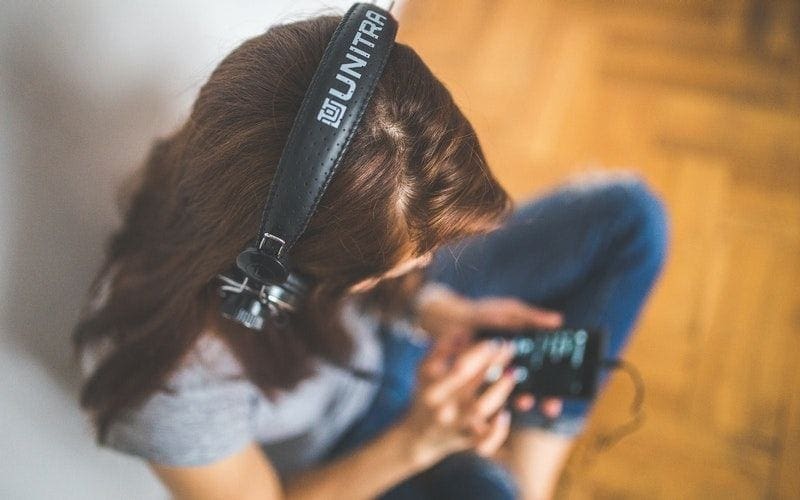 women listening to pandora music site