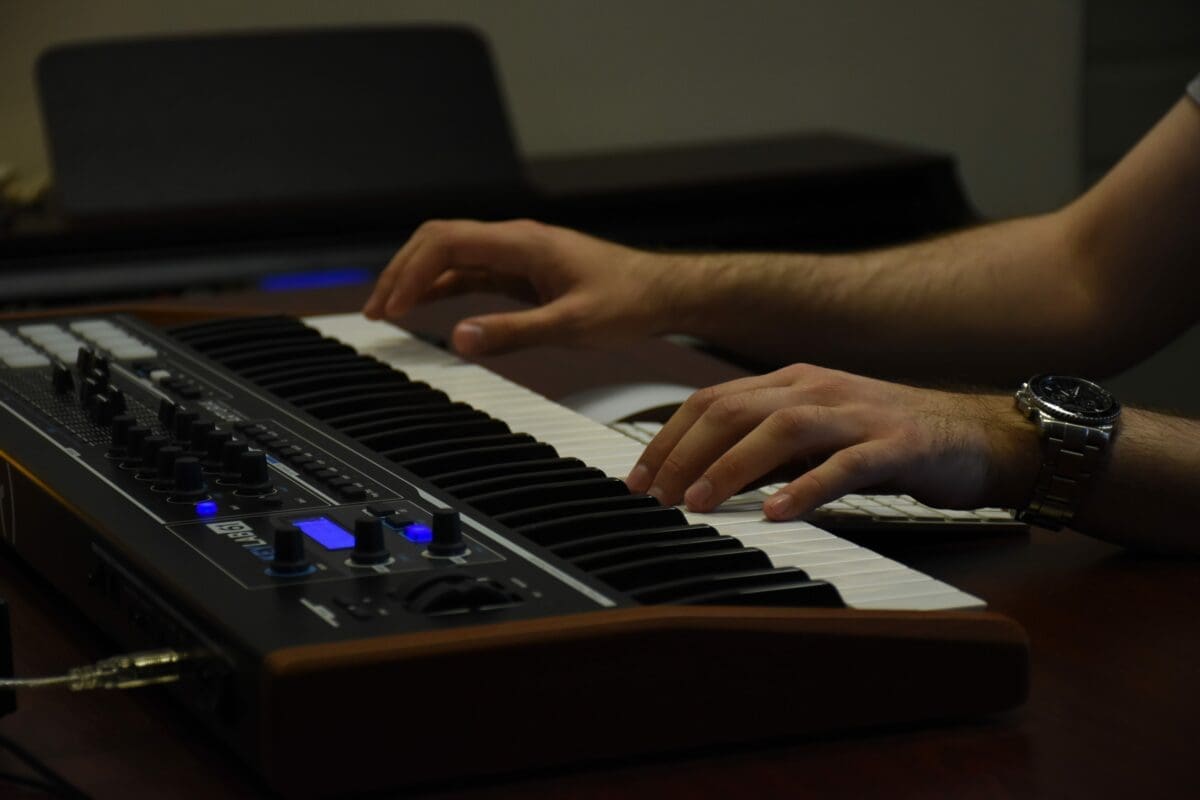 man playing keyboard