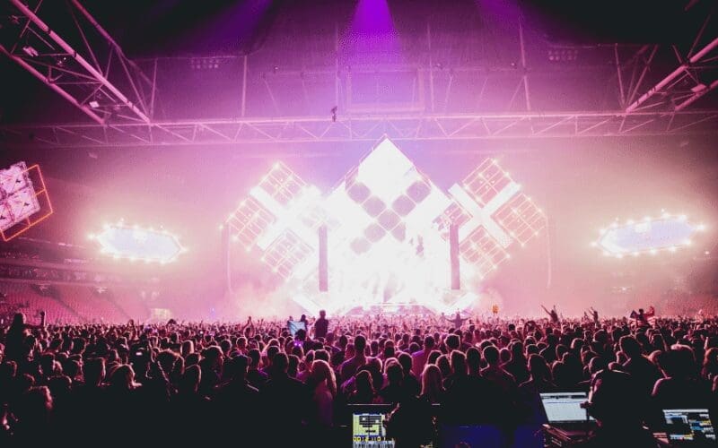 An audience watching a show at Amsterdam dance event.