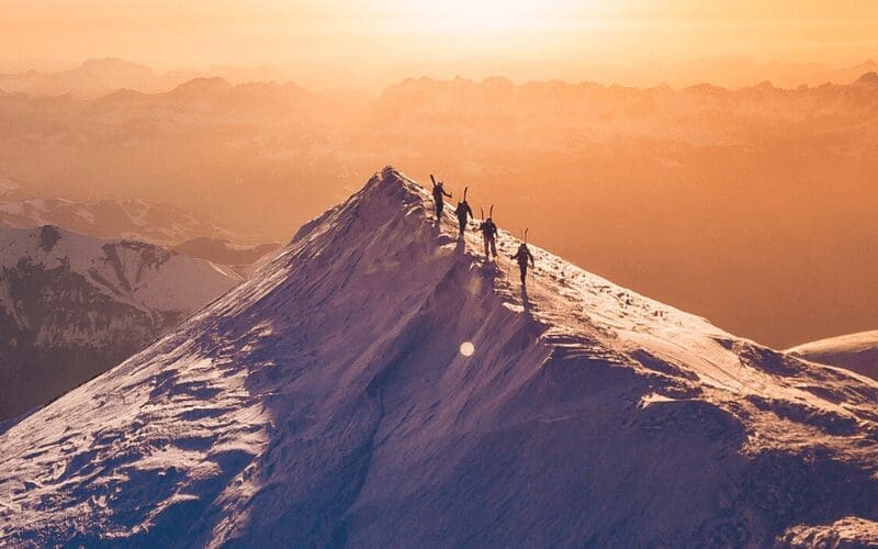 establishing shot people on mountains 