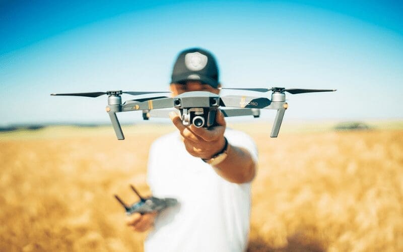 man holding drone 