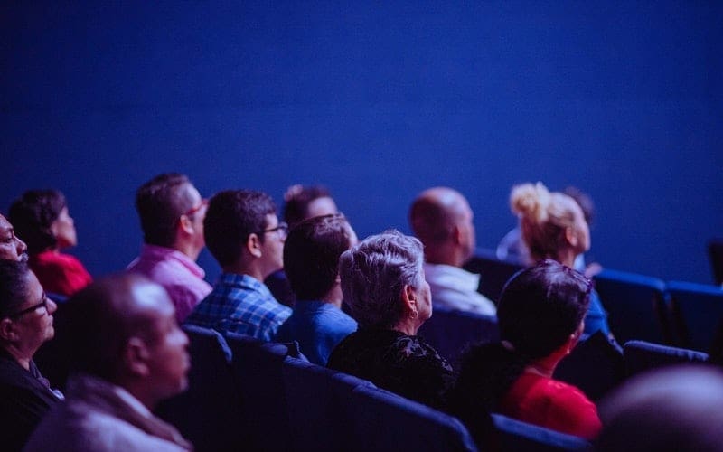 audience watching in a theatre