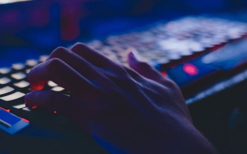 person on keyboard