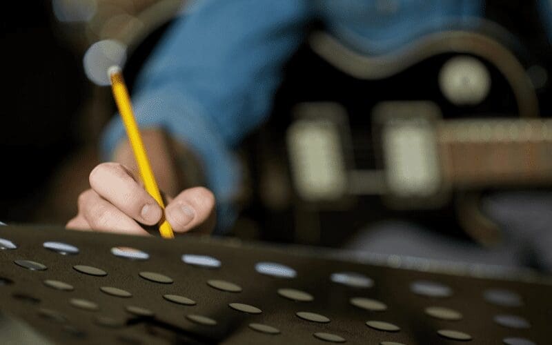 writing music with guitar
