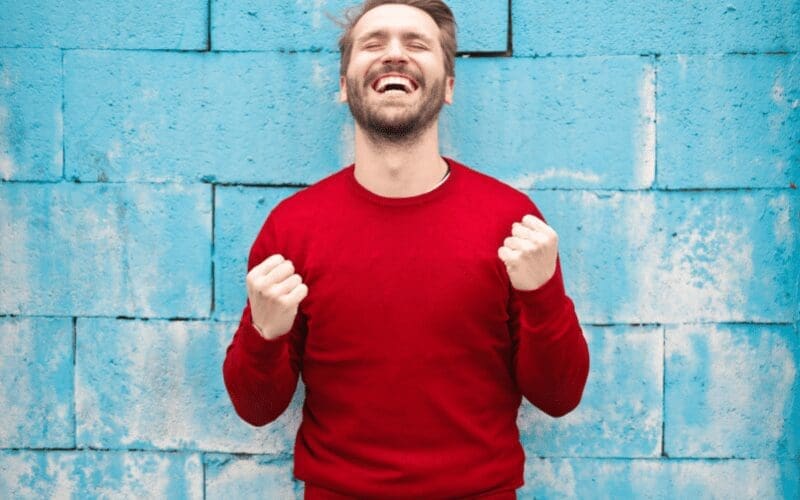 happy man after learning guitar
