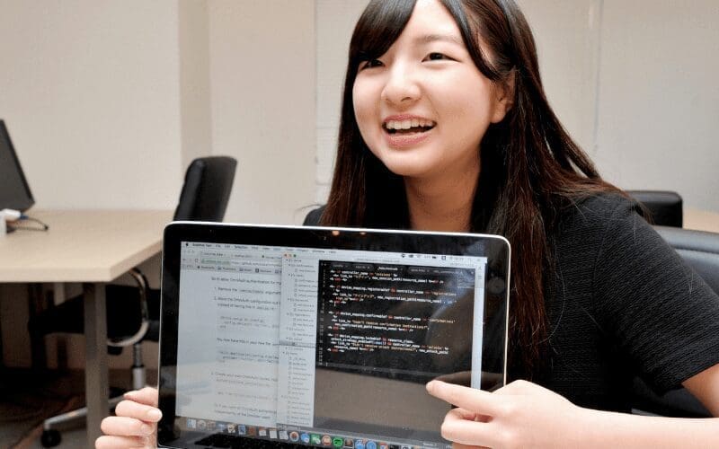 computer programmer with code